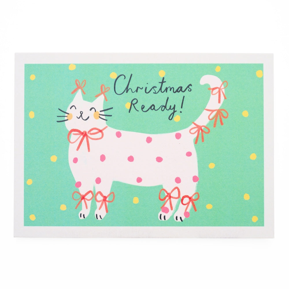 Greetings card with a cat illustration and 'christmas ready!' text on a green background