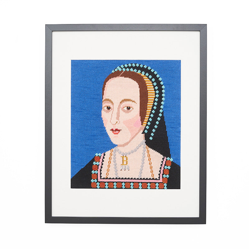 Framed anne boleyn tapestry needlepoint portrait featuring a women in black regal dress wearing a letter b necklace.