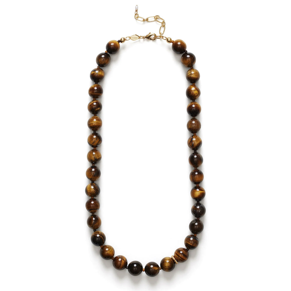 Necklace with brown beaded chain on a white background