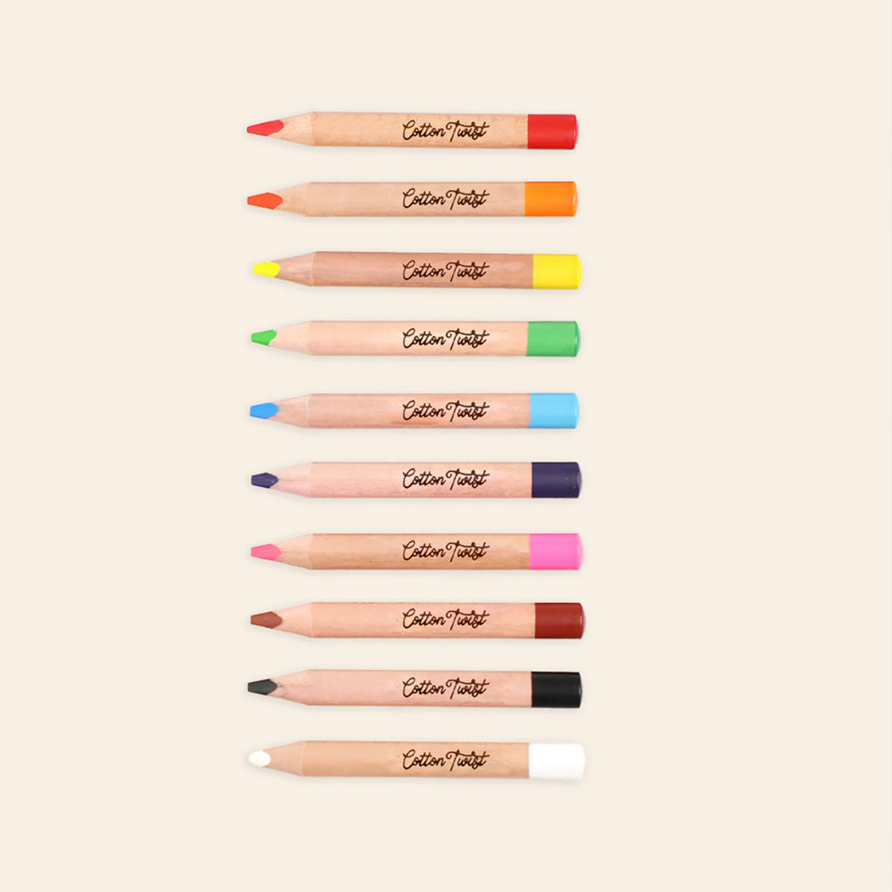 A line of coloured pencils against a beige background
