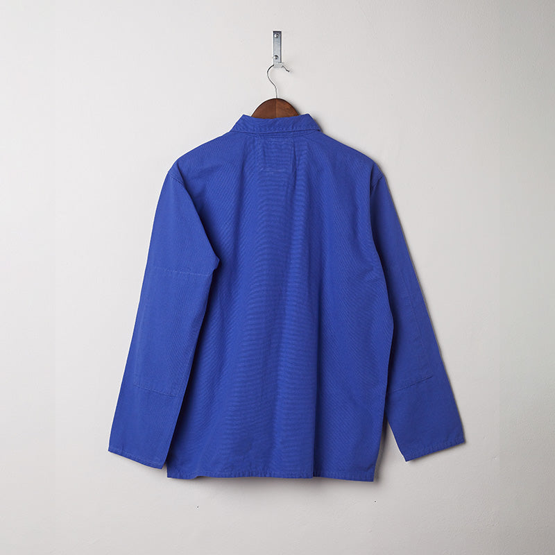 Image: back of the buttoned ultra blue overshirt