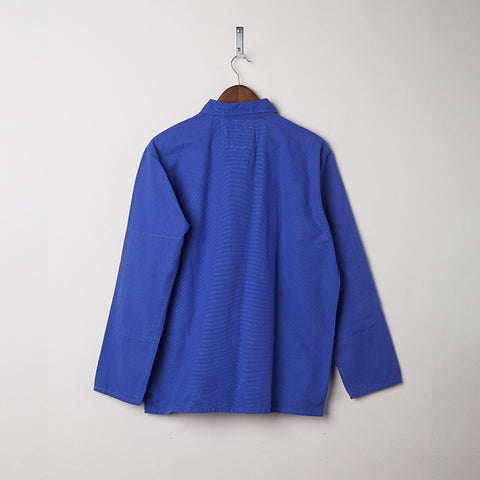 Back of the buttoned ultra blue overshirt