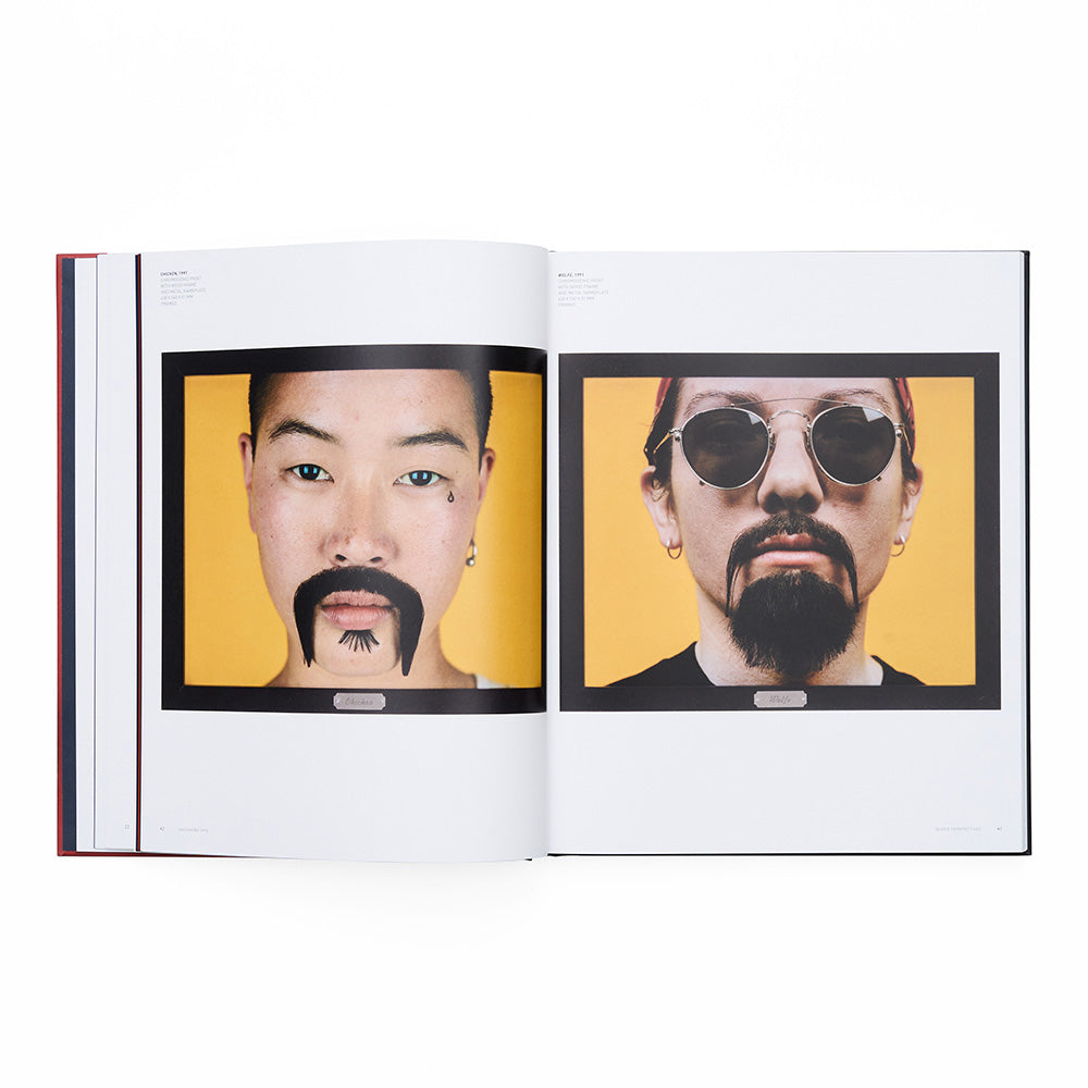 Open book showing two portraits with a yellow background
