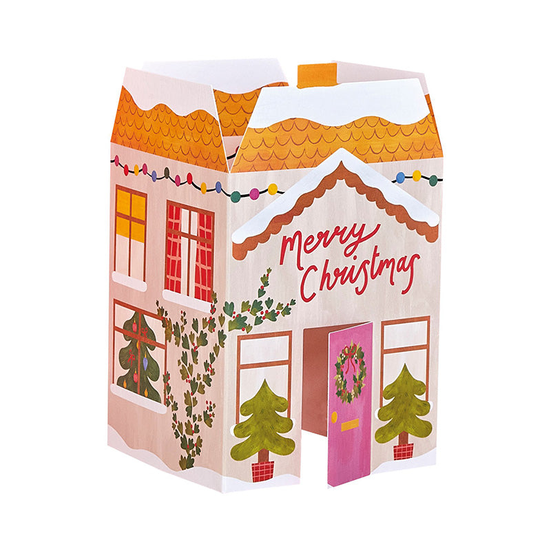 A fold out christmas card that folds out to a snowy house.
