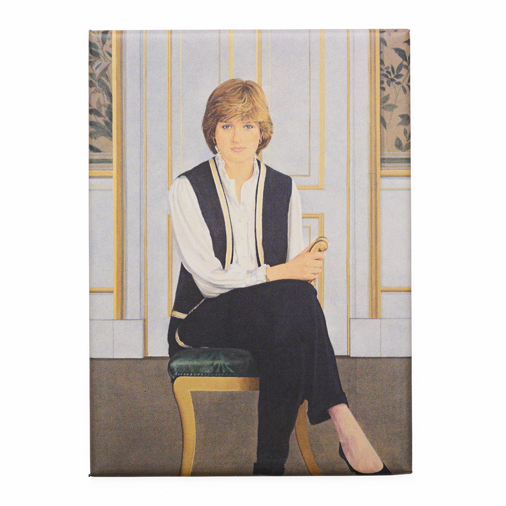 A rectangular magnet featuring a portrait of a women with short blonde hair sitting on a chair with a door and patterned wallpaper in the background.