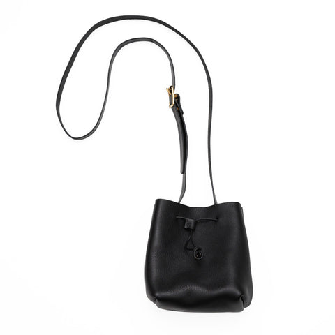 Small black pouch purse with adjustable strap.
