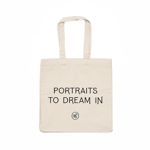 Reverse of tote bag with 'Portraits to Dream in' in black text with NPG monogram. 