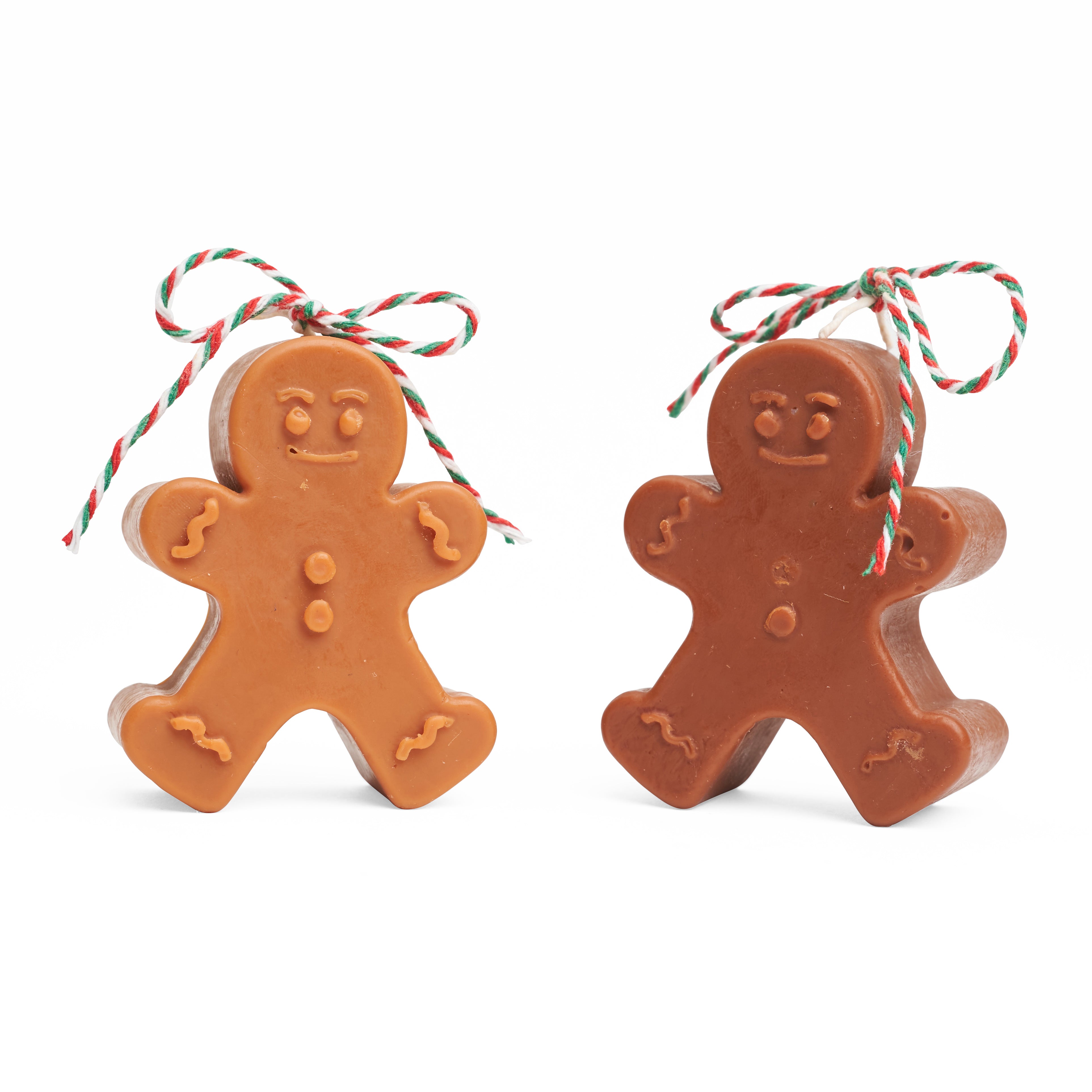 Dark brown and light brown gingerbread men side by side.