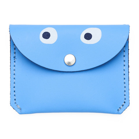 Mini blue purse with popper close featuring a printed googly eye design.