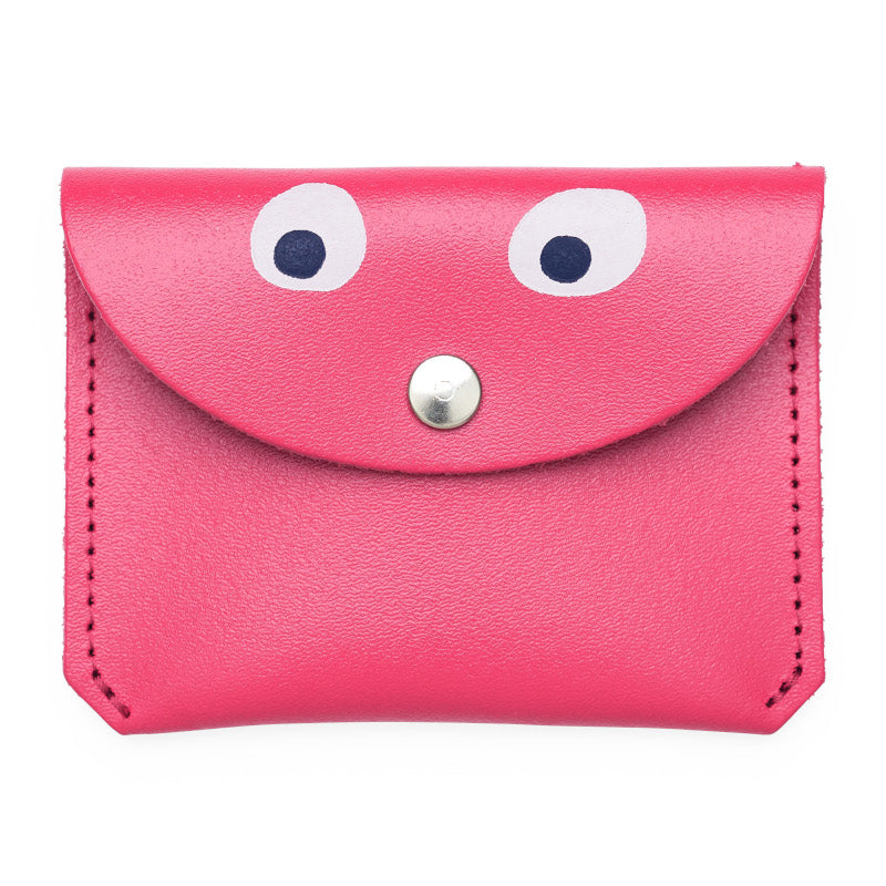 Mini pink purse with popper close featuring a printed googly eye design.