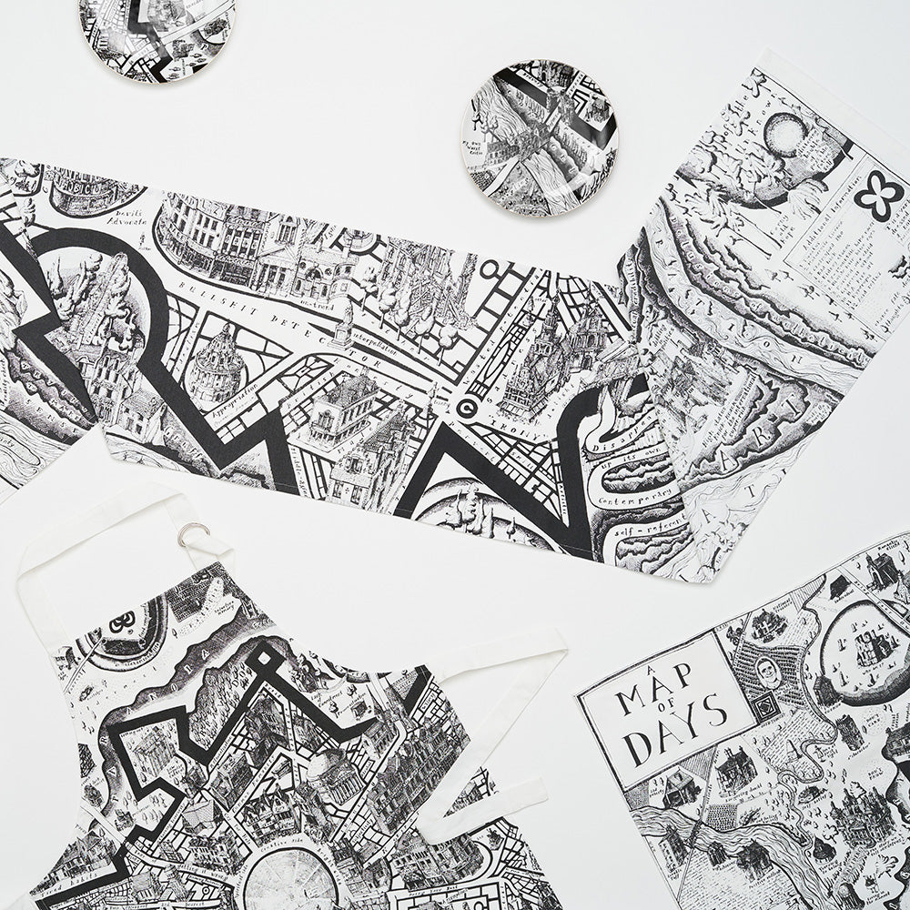 Black and white map illustrated homeware items on a white background