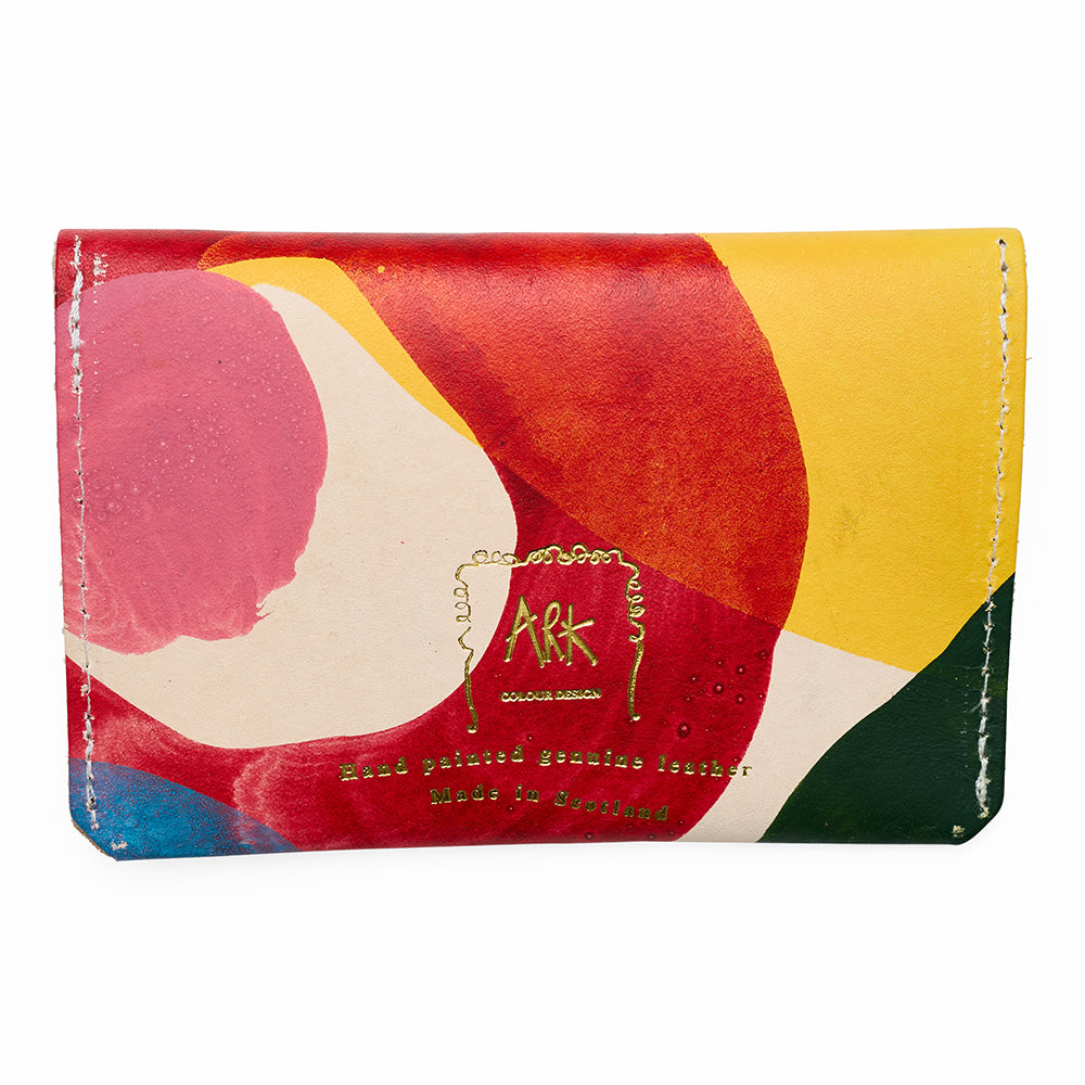 Colorful wallet with abstract design and 'ark' branding on a white background