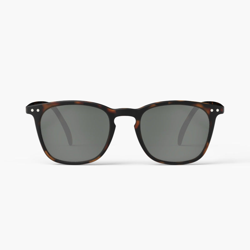 A pair of sunglasses in a dark brown tortoiseshell frame.