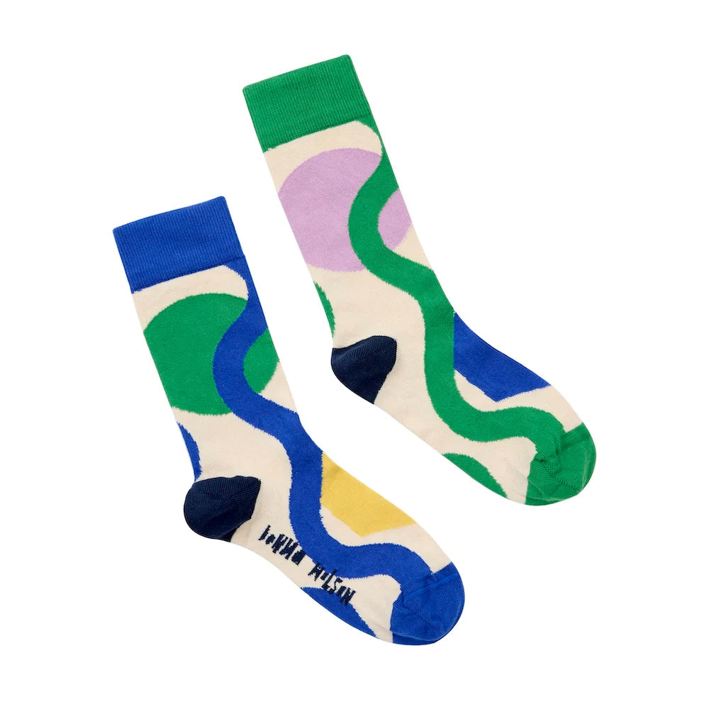 Colorful socks with wavy patterns on a white background