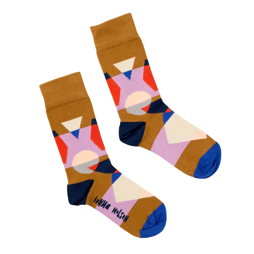 Colorful socks with geometric patterns on a white background