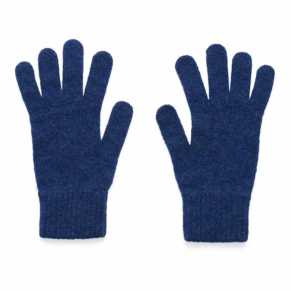 Pair of knitted dark blue gloves on a white background