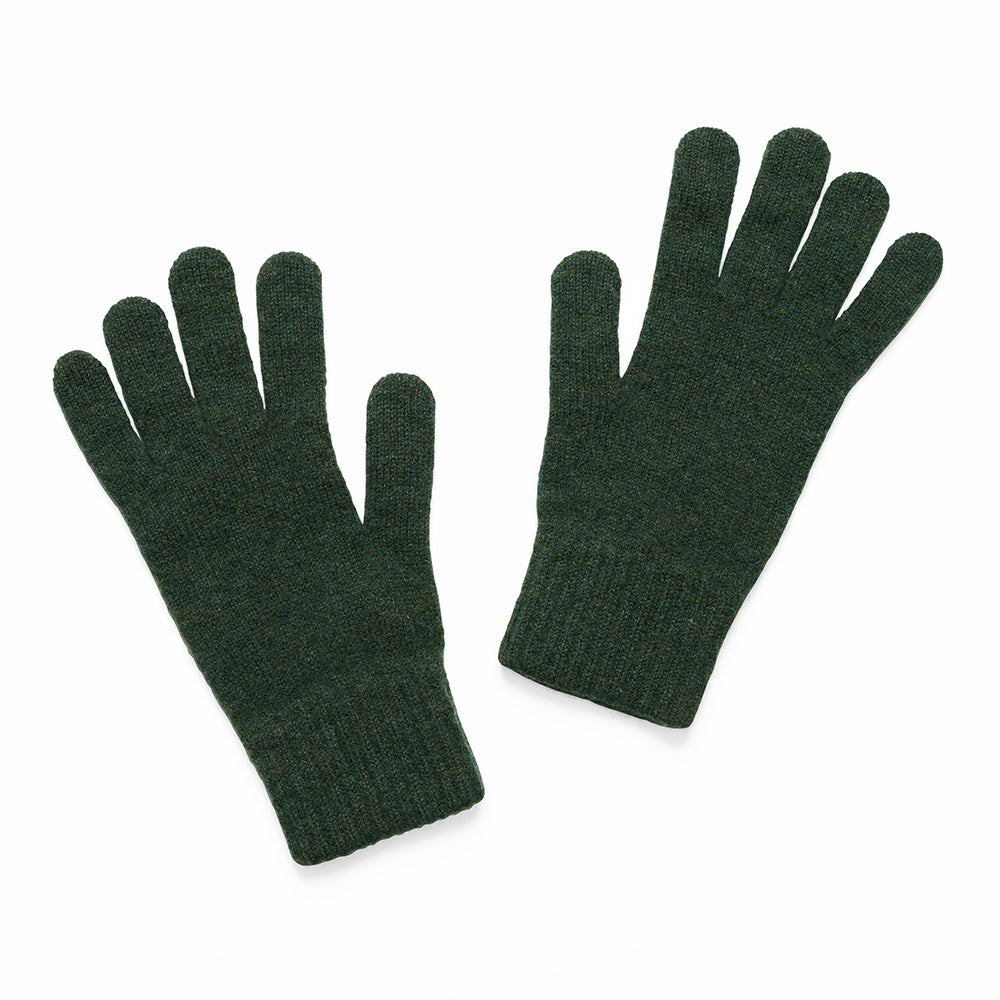 Pair of knitted dark green gloves on a white background