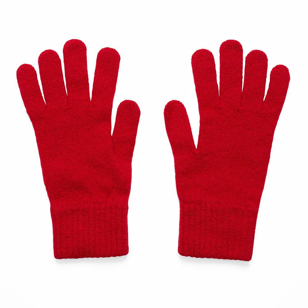 Pair of knitted red gloves on a white background