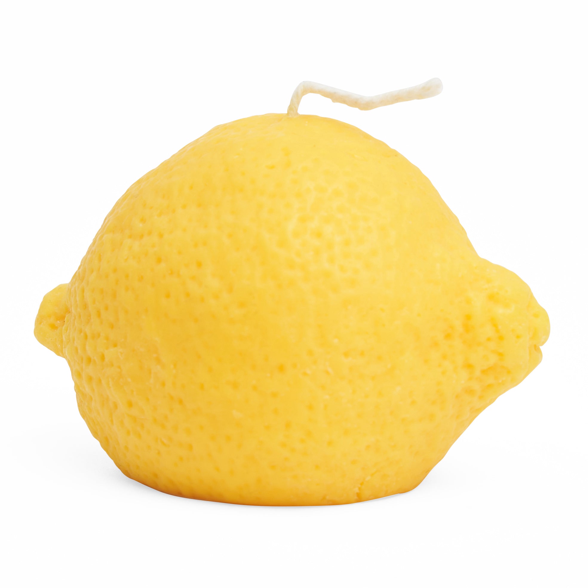 Yellow lemon shaped candle.