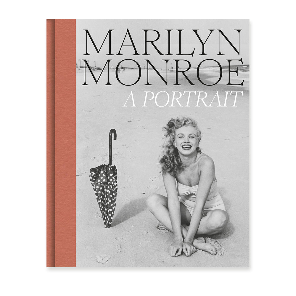 Book cover featuring a black and white photo of marilyn monroe with an umbrella on a beach and the title 'marilyn monroe a portrait'.