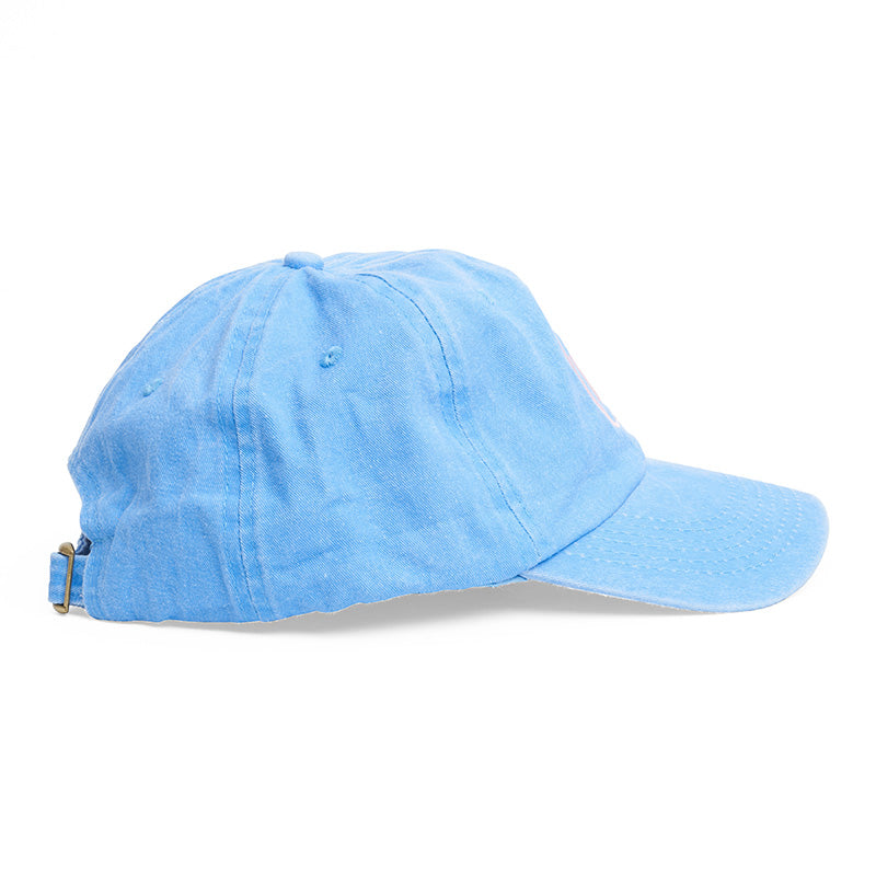 A bright blue baseball hat from the side view.