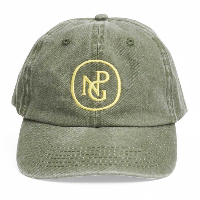 A green khaki coloured baseball cap with the npg logo in bright yellow on the front.