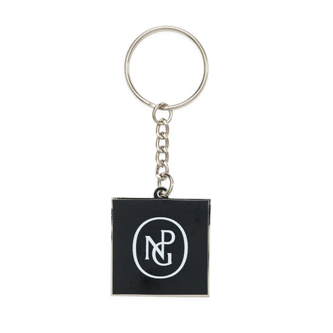 Reverse of square black enamel keyring with the NPG monogram in white.