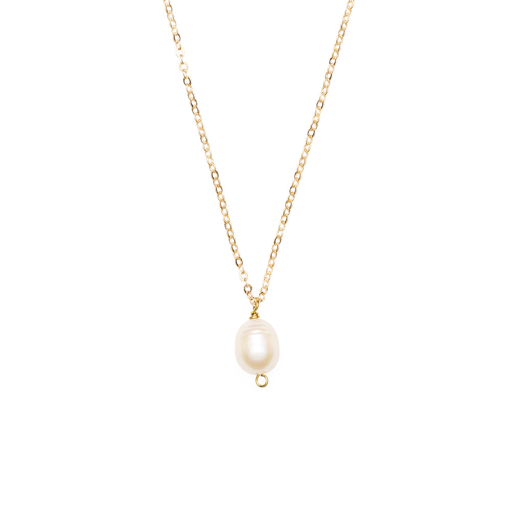 Gold necklace with a single pearl pendant on a white background
