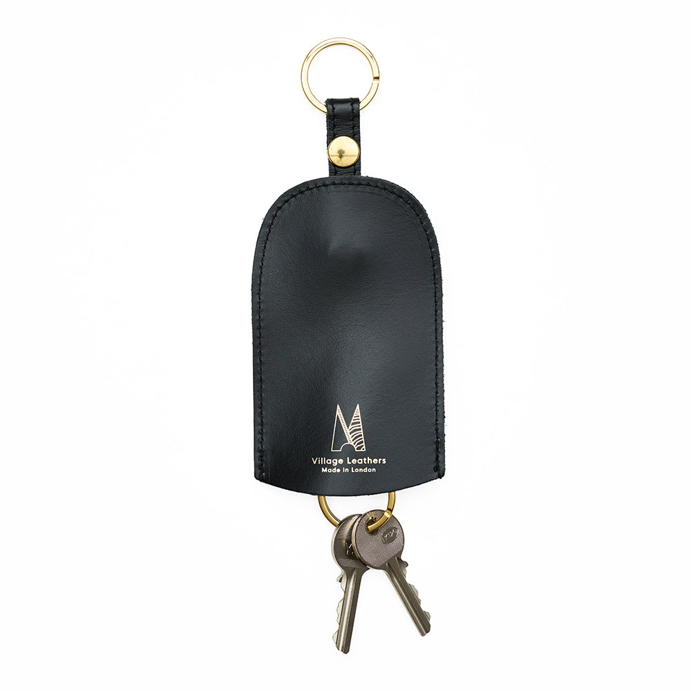 Roam bell key holder front styled tan black