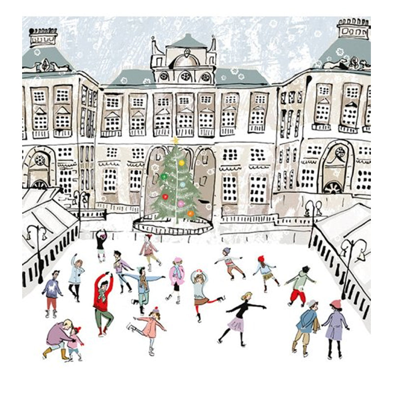 Several people skating on a rink outside a big historic building.