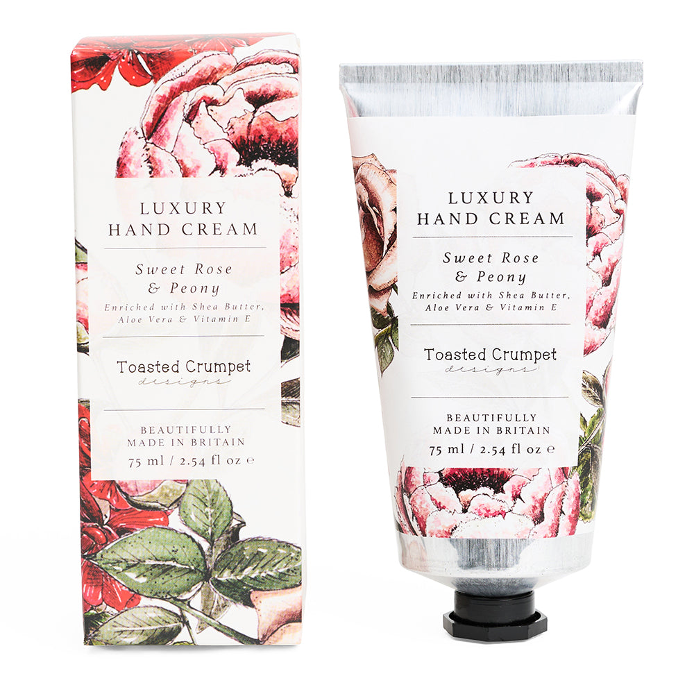 Luxury hand cream with floral packaging on a white background