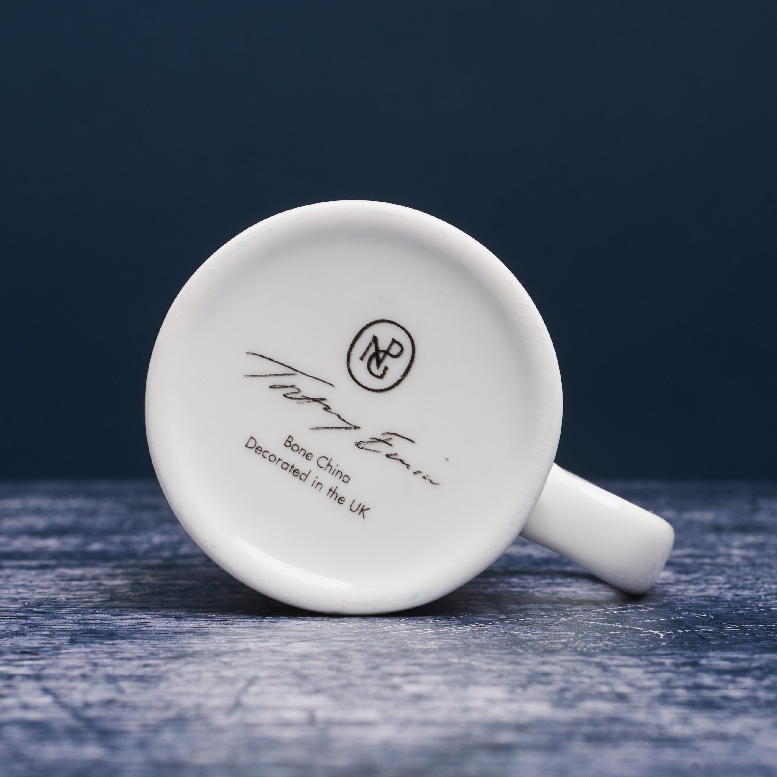 Bottom of milk jug with tracey emin signature and npg logo.