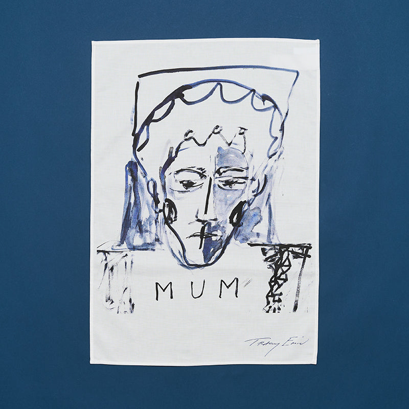 A white cotton tea towel with a blue and black print of a portrait and the word mum on it signed by tracey emin.