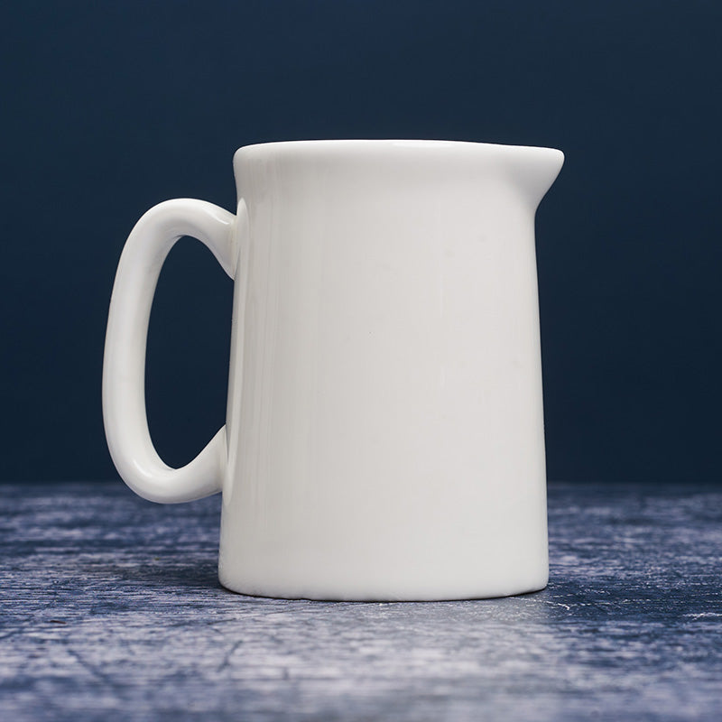 Reverse of white milk jug.