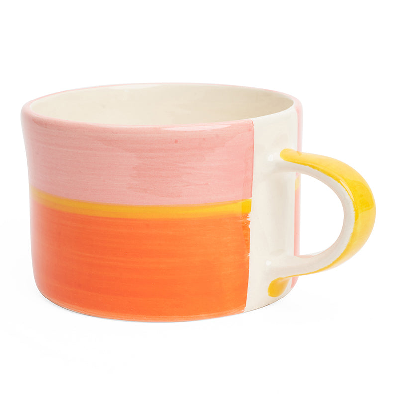 Three toned mug in pink, yellow and orange.
