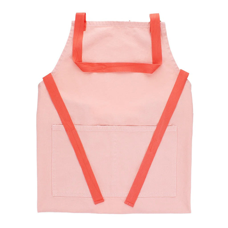 Front view of a light pink cotton apron with contrasting deeper pink neck and waist straps and a front pocket.