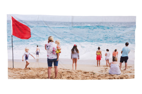 Beach towel featuring an image of Martin Parr’s beach scene in "Porthcurno, Cornwall, England (2017)."