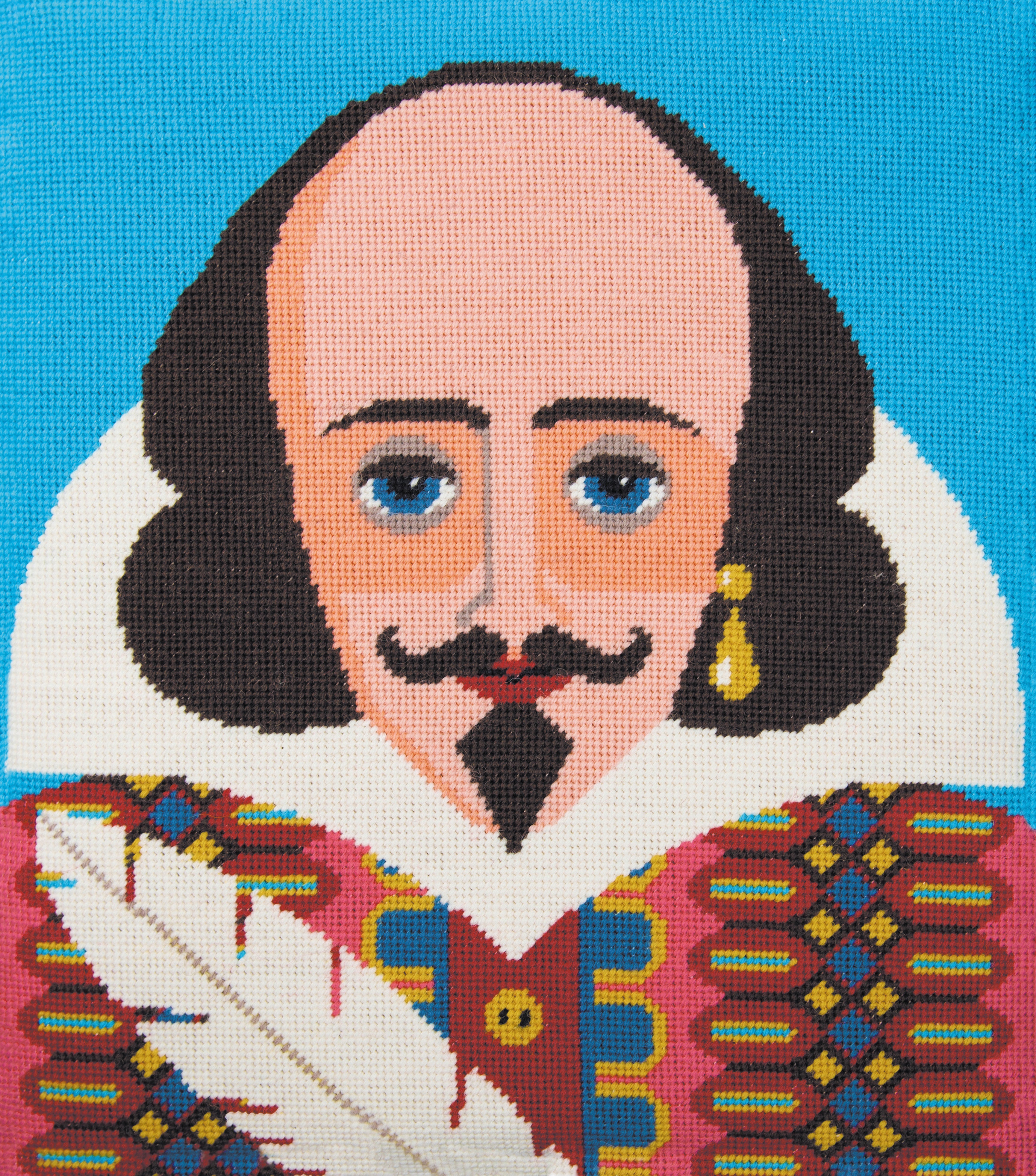 Colourful needlepoint tapestry of william shakespeare portrait.