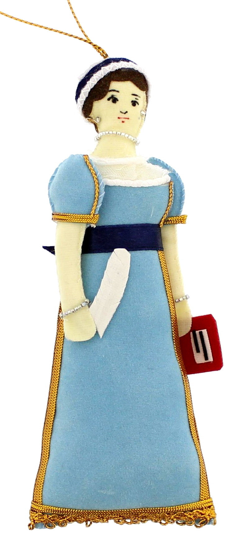 Handmade fabric sewn decoration featuring jane austen in a blue dress with gold embroidered details, holding a quill.