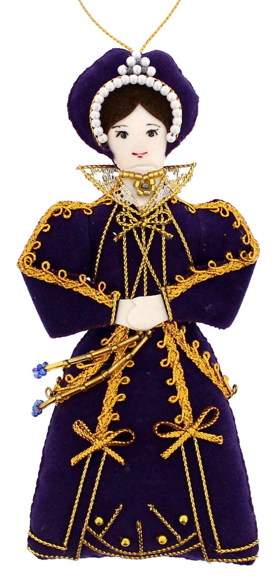 A textile decoration has a woman with dark hair and an elegant dark purple gown with gold trim.