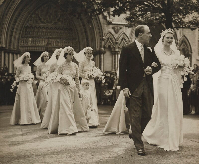 Viscount and viscountess cowdray with their bridesmaids and page boy npg x76569