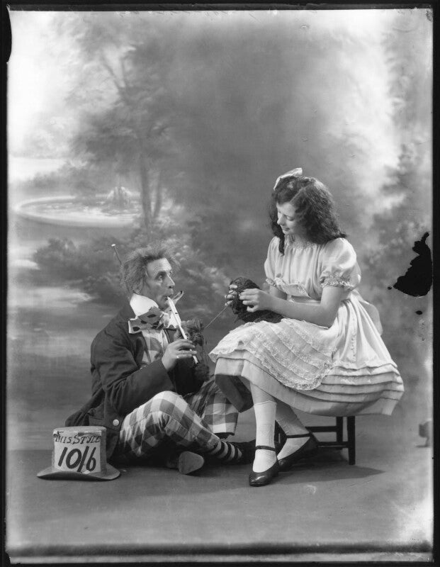 Charles hayden coffin as the mad hatter; phyllis griffiths as alice in 'alice in wonderland' at the garrick theatre npg x121239