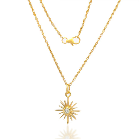 Felicty star pendant with clear crystal stone on a gold chain necklace. 
