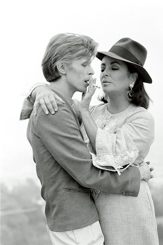 Black and white photograph of David Bowie and Elizabeth Taylor by Terry O'Neill.