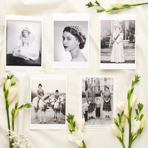 Display of five Queen Elizabeth II portfolio prints.