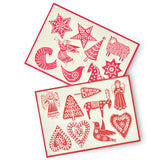 The sheets of decorations, 18 in total, in red and cream in different Christmas shapes. 