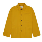 Front view of a yellow overshirt with collar, buttons and 3 front pockets.