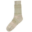 Textured knitted sock in neutral tones on a white background