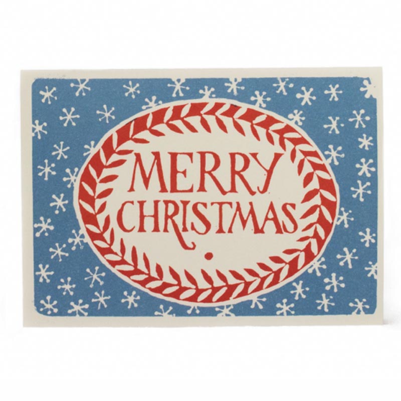 An image of a christmas card featuring a 'merry christmas' message in blue and red