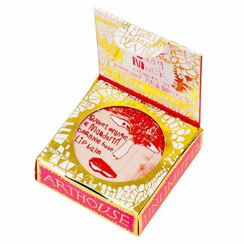 Red lip balm case in gold and red detailed packaging.